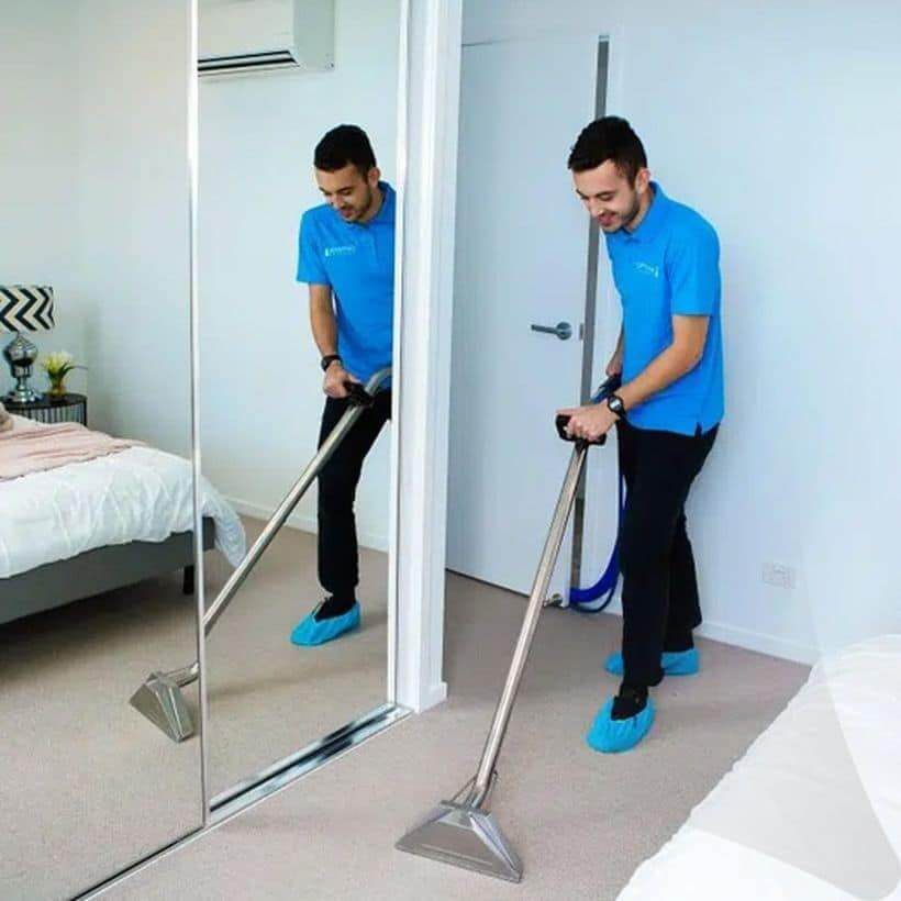 A man Cleaning Carpet