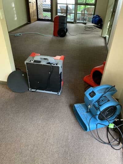 Together air movers and dehumidifiers evaporate the moisture from the carpet