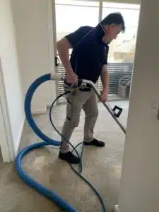 Squeaky Clean's Richard Cleaning Clients Carpet