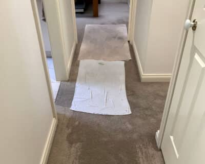 DIY Drying saturated carpet with towels